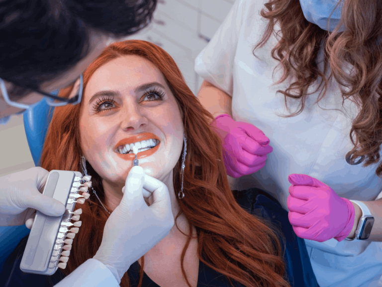 Woman having her teeth shade assessed